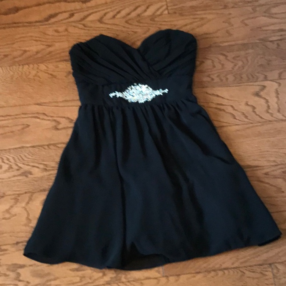 B. Smart black cocktail dress